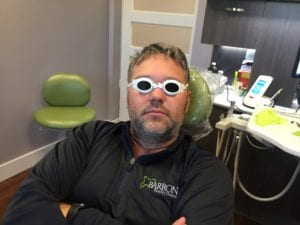 Zak in glasses.